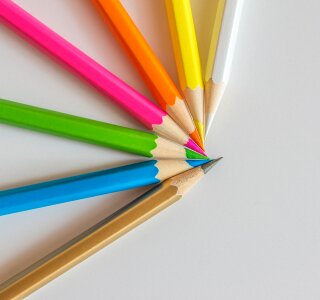 Colored pencils wooden pegs wood colors