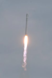 CRS-2 Dragon and Falcon 9 in flight photo