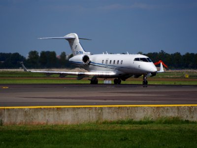 CS-TFV Omni - Aviacao E Tecnologia Bombardier BD-100-1A10 Challenger 300 taxiing at Schiphol (AMS - EHAM), The Netherlands, 18may2014, pic-1