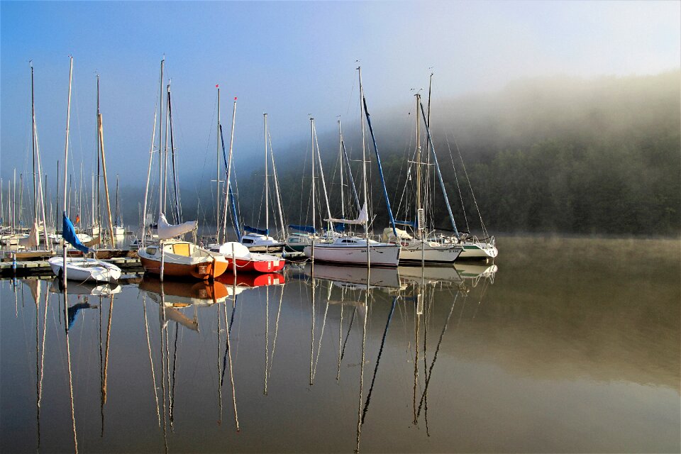 Morning haze water sports sail masts
