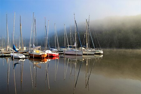 Morning haze water sports sail masts