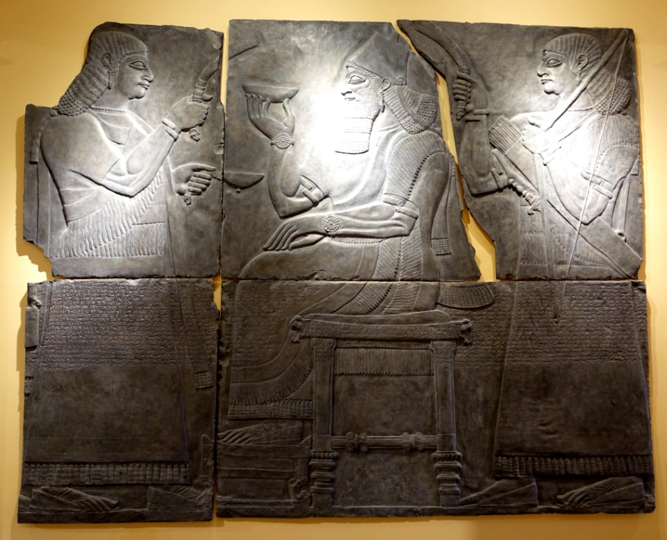 Court scene with Ashurnasirpal and eunuchs, resin cast of plaster cast of original in British Museum, Northwest Palace, Room G, Slabs 2-3, c. 865-860 BC - Harvard Semitic Museum - Cambridge, MA - DSC06437