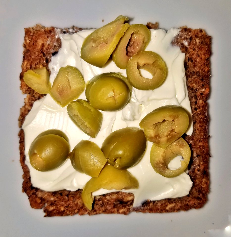 Cream cheese and olive sandwich on German three-grain bread - Massachusetts