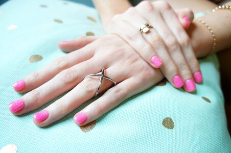 Rings hand pink nail polish photo