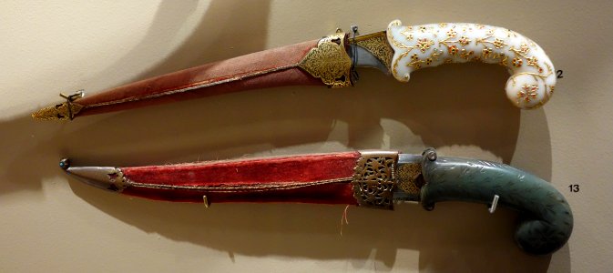 Daggers, N. India, Mughal, (top) 19th c., jade hilt inset w. colored stones, velvet-covered wooden sheath, (bottom) early 17th c., jade hilt, watered steel damascened with gold - Huntington Museum of Art - DSC04949
