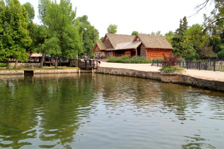 D.C. Booth Historic National Fish Hatchery rainbow trout pond and visitor center in Spearfish, South Dakota