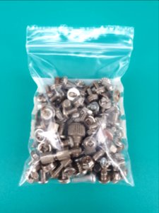 Computer screws in a zipper storage bag - 6 x 9 cm - on Aqua Deep plastic