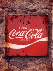 Plate coca cola sign photo
