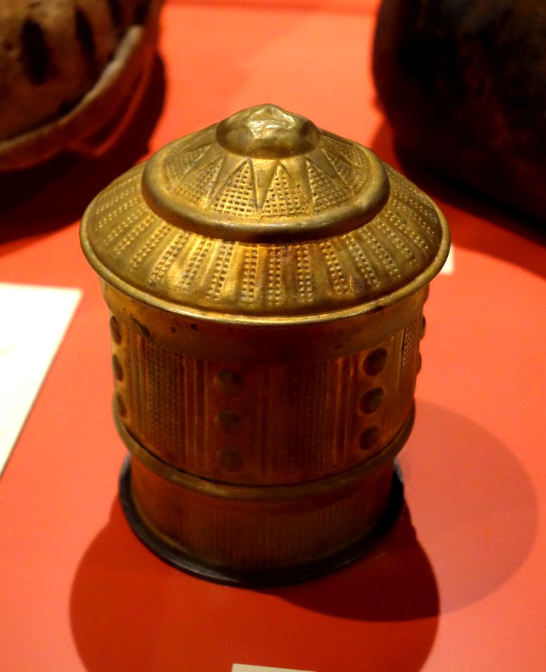Cosmetic container, Akan, embossed brass - Glenbow Museum - DSC00206
