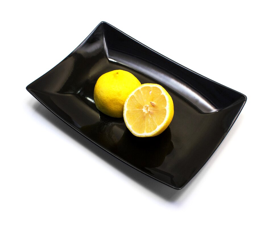 Citrus white background black plate