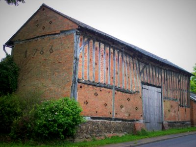 Cosby, barn in village centre