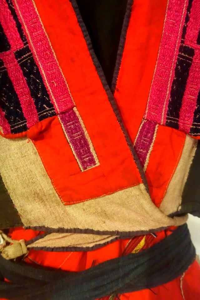 Costume detail, Pathen, Tuyen Quang, 1968, industrial cotton, applique, woven patterns - Vietnamese Women's Museum - Hanoi, Vietnam - DSC03819