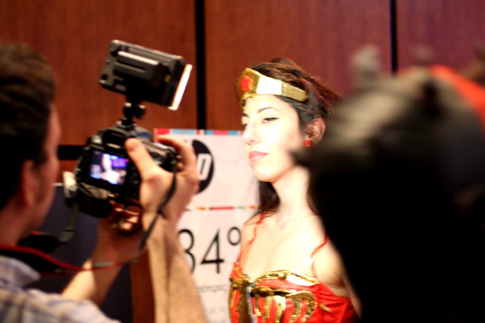 Cosplayers at Comicdom 2012 in Athens, Greece grant interviews to the MTV television channel 27