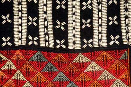 Costume, Xa Pho, Lao Cai, 1970, view 2, handmade cotton, indigo, Job's Tears seeds, woven and embroidered patterns - Vietnamese Women's Museum - Hanoi, Vietnam - DSC03711