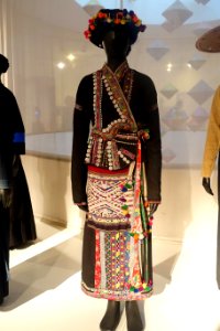 Costume, Lao, Lai Chau, 2001, view 1, cotton, metal coins, wool, woven patterns with extra weft, applique, embroidery - Vietnamese Women's Museum - Hanoi, Vietnam - DSC03853