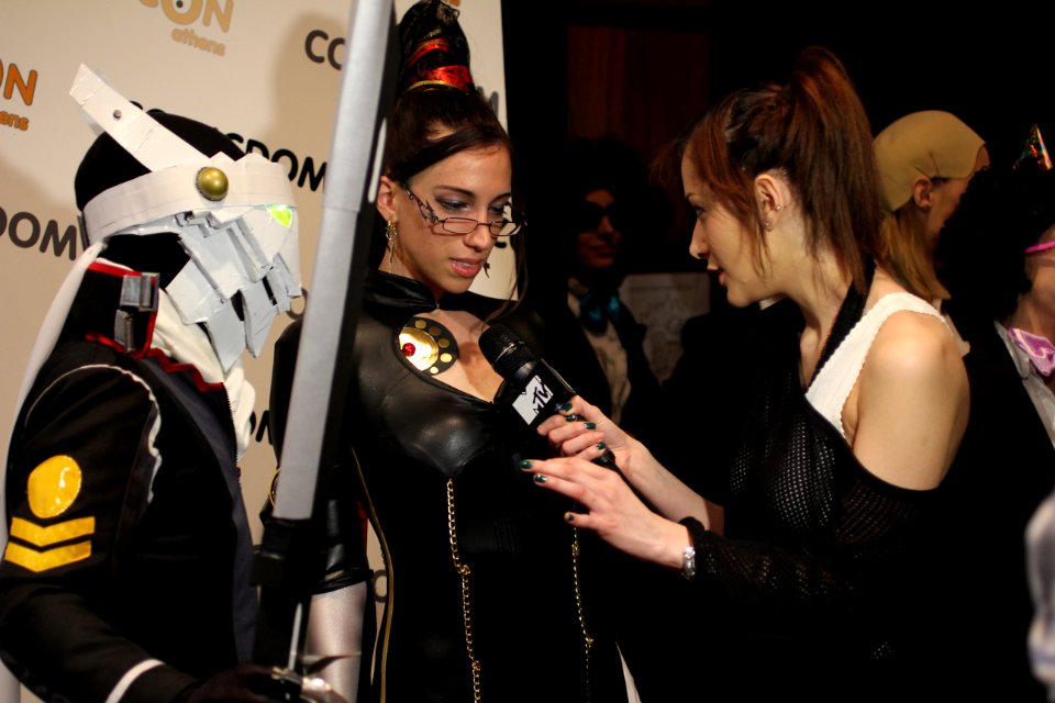 Cosplayers at Comicdom 2012 in Athens, Greece grant interviews to the MTV television channel 33