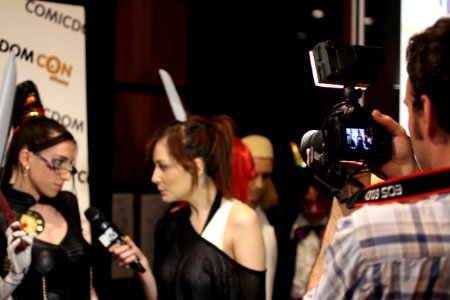 Cosplayers at Comicdom 2012 in Athens, Greece grant interviews to the MTV television channel 09