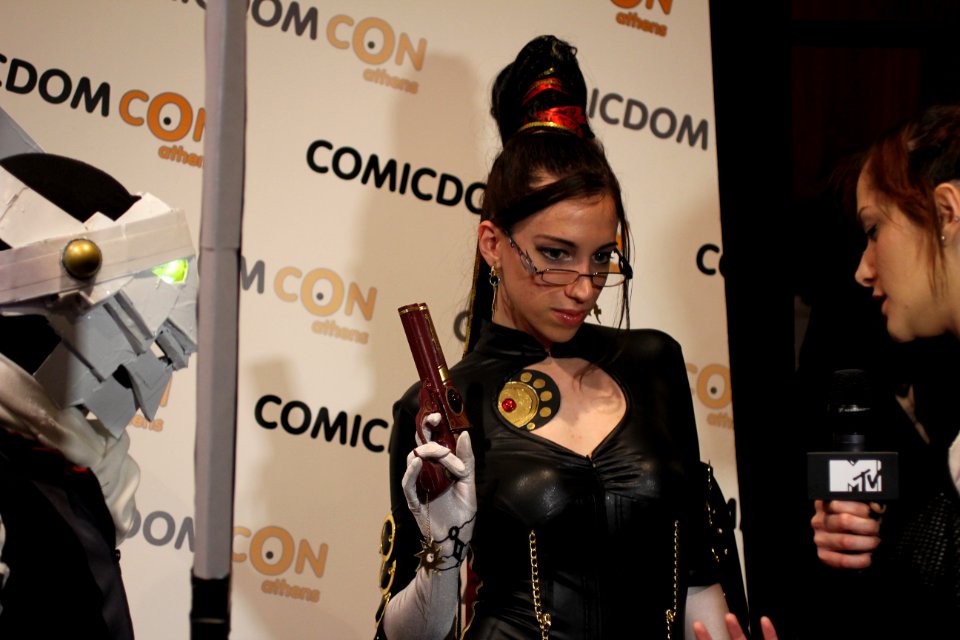 Cosplayers at Comicdom 2012 in Athens, Greece grant interviews to the MTV television channel 19