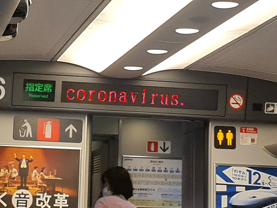 Coronavirus announce and person wearing maskin Tokaido Shinkansen