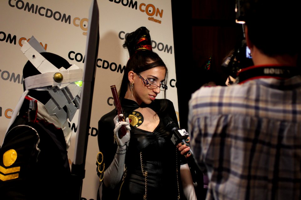 Cosplayers at Comicdom 2012 in Athens, Greece grant interviews to the MTV television channel 14
