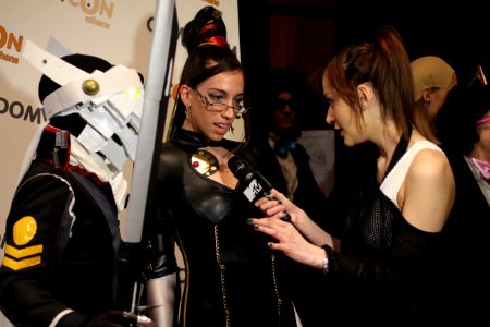 Cosplayers at Comicdom 2012 in Athens, Greece grant interviews to the MTV television channel 34