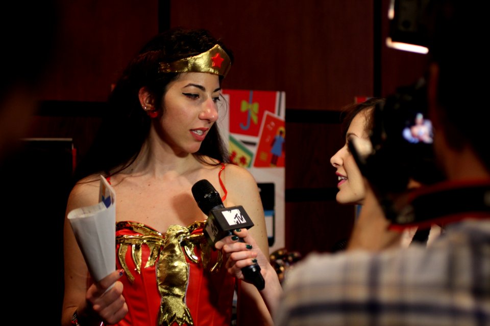 Cosplayers at Comicdom 2012 in Athens, Greece grant interviews to the MTV television channel 23