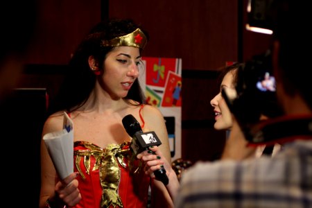Cosplayers at Comicdom 2012 in Athens, Greece grant interviews to the MTV television channel 23