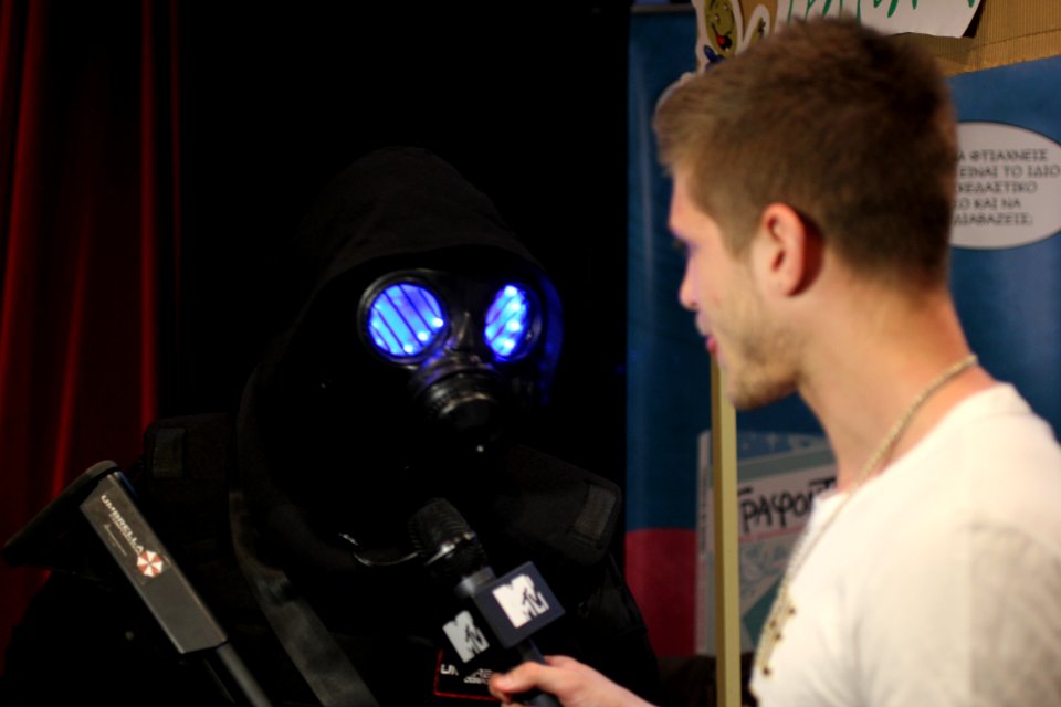 Cosplayers at Comicdom 2012 in Athens, Greece grant interviews to the MTV television channel 01