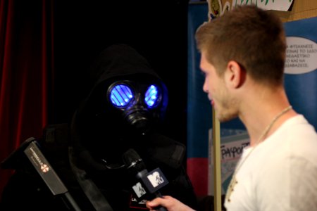 Cosplayers at Comicdom 2012 in Athens, Greece grant interviews to the MTV television channel 01