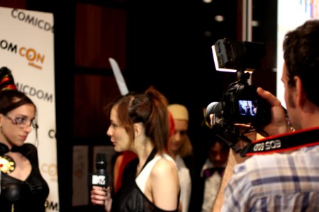 Cosplayers at Comicdom 2012 in Athens, Greece grant interviews to the MTV television channel 07