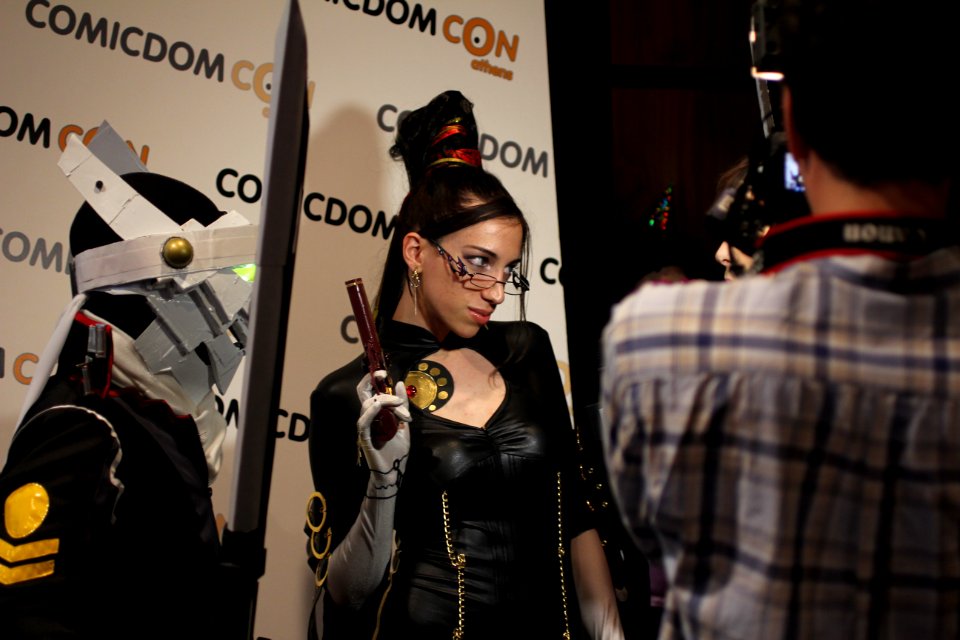 Cosplayers at Comicdom 2012 in Athens, Greece grant interviews to the MTV television channel 15
