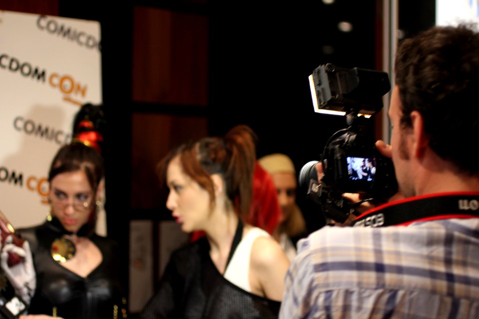 Cosplayers at Comicdom 2012 in Athens, Greece grant interviews to the MTV television channel 06