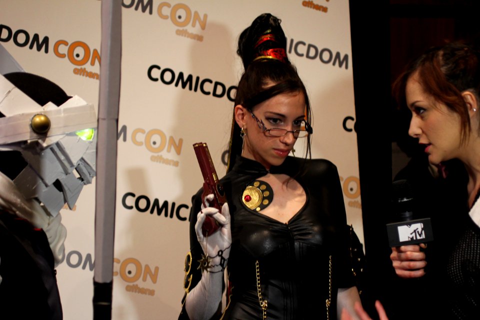 Cosplayers at Comicdom 2012 in Athens, Greece grant interviews to the MTV television channel 18