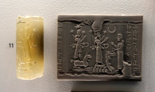 Deities and worshipper, cylinder seal inscribed 'belonging to Ubashi... eunuch of Piqitti-ilima', Neo-Assyrian, c. 883-612 BC, smoky chalcedony - Sackler Museum - Harvard University - DSC01723