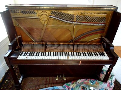 Demolition of upright Knabe piano keyboard hammers removed