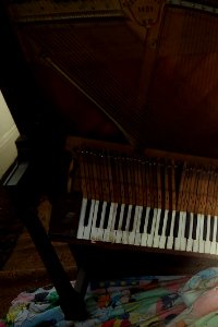 Demolition of upright Knabe piano keyboard area