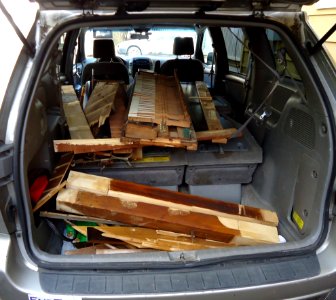 Demolition of upright Knabe piano parts to dump