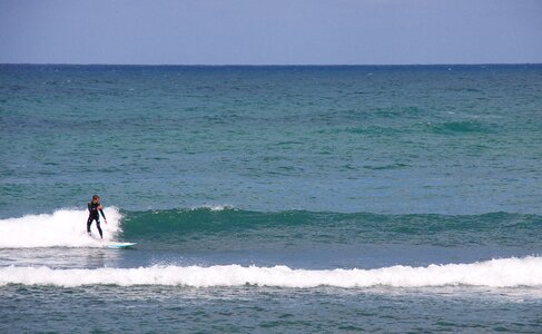 Waves surfer surfing