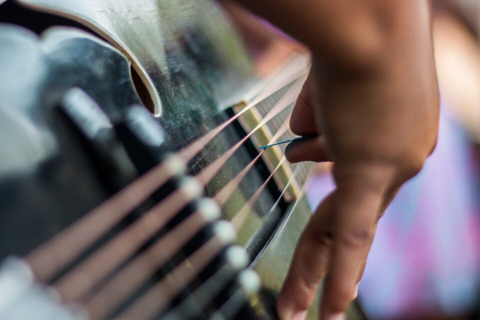 Hands play instrument