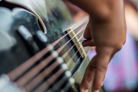 Hands play instrument photo