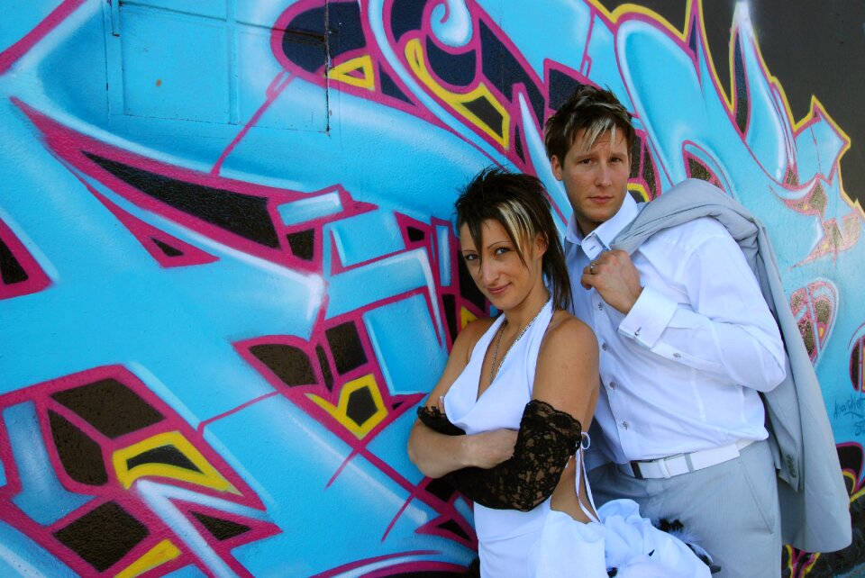 Young couple wedding street art