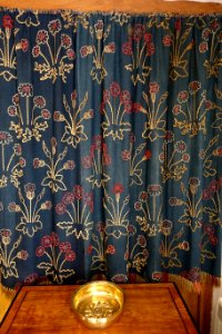 Daisy wall hangings, designed by William Morris for Red House, worked by William and Jane Morris, 1860, couched wools on wool serge - Kelmscott Manor - Oxfordshire, England - DSC09983