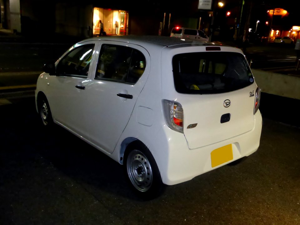 Daihatsu Mira e;S (LA310S) at night rear