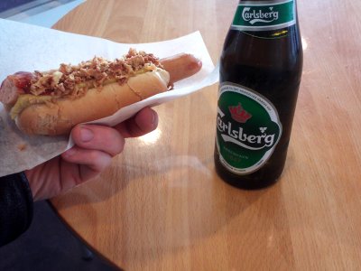 Danish hot dog and beer at Copenhagen Airport