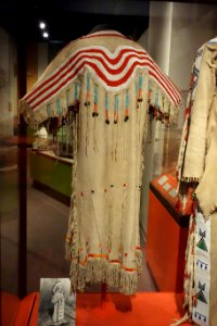 Dress, Tsuu T'ina, early 1900s, hide, glass beads, metal - Glenbow Museum - DSC00851
