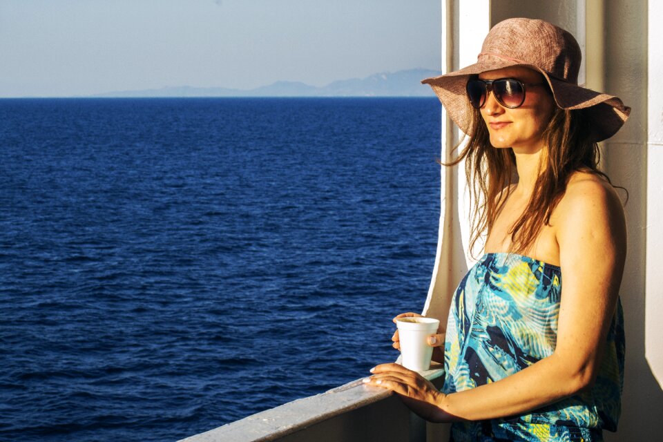At the sea girl looking at the sea young