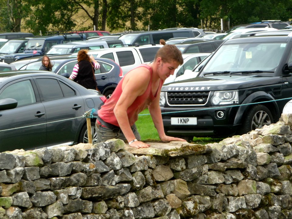 Dry stone wall building 02