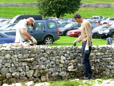 Dry stone wall building 05