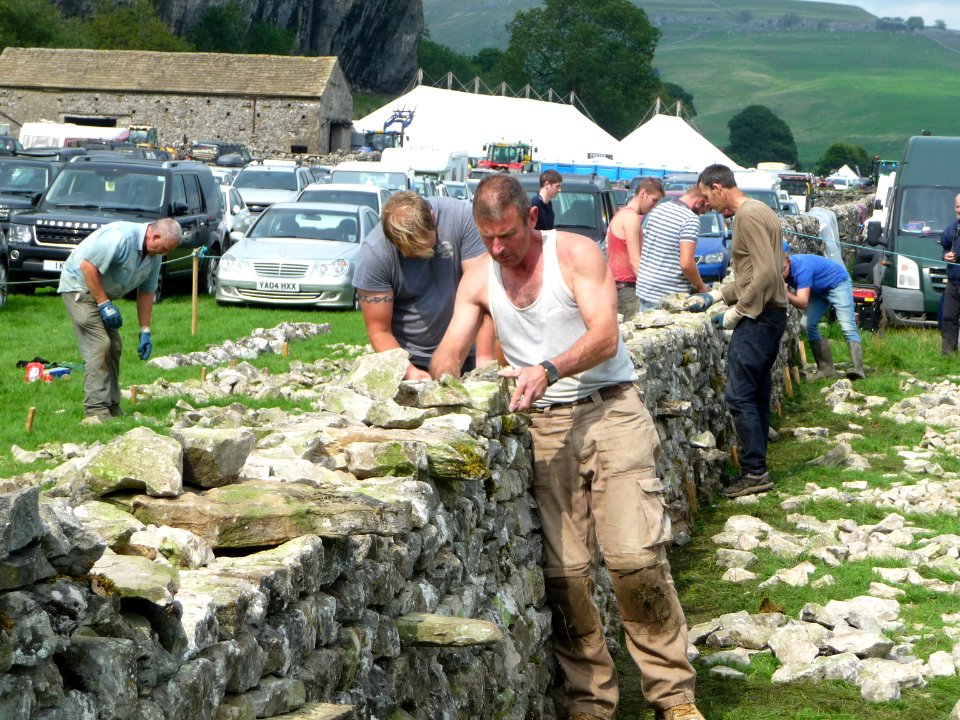Dry stone wall building 06