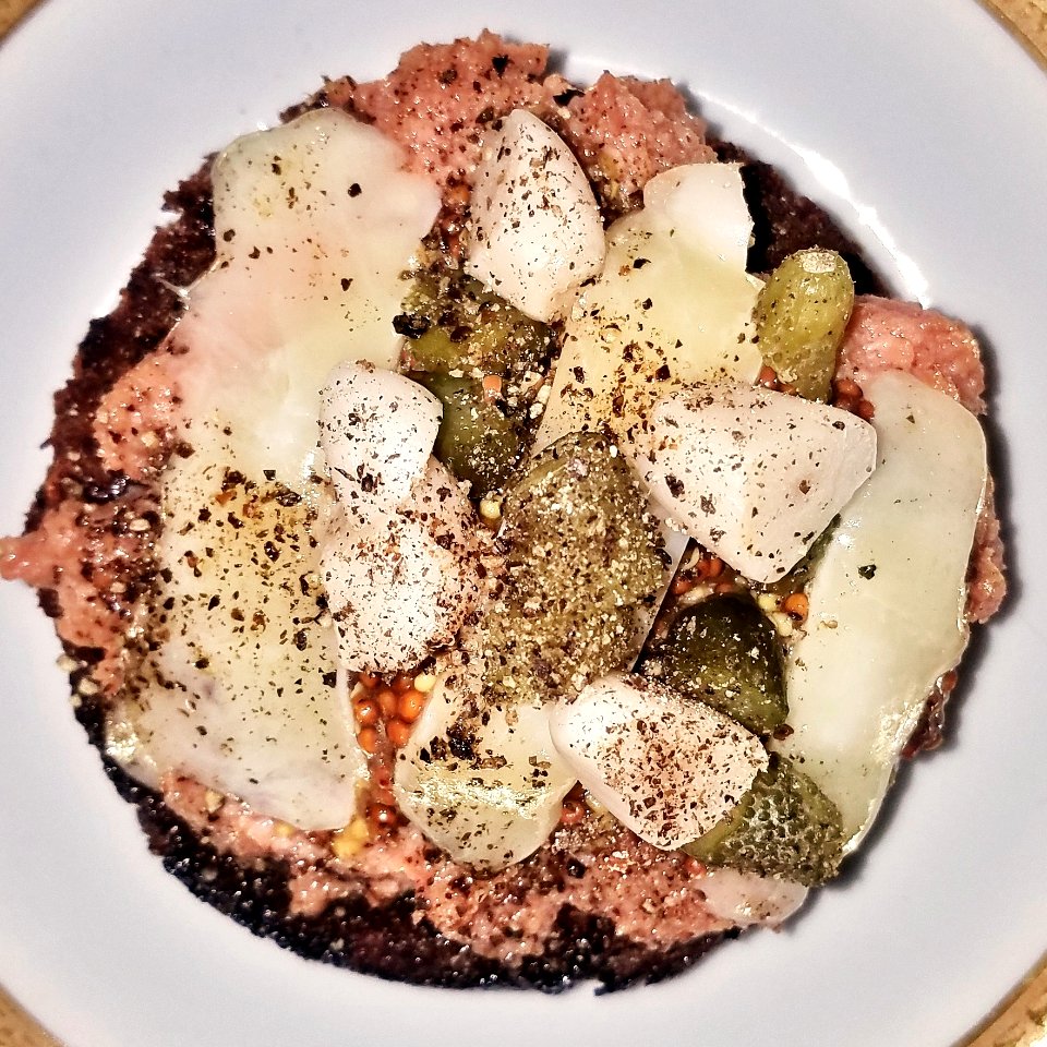Deviled ham with cheddar, cornichons, pickled garlic, mustard, and black pepper on toasted Boston brown bread - Massachusetts